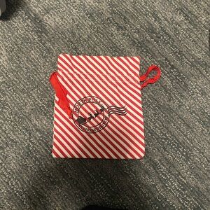 Red and White Striped Drawstring Bag